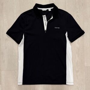 Calvin Klein Black and White Polo Shirt
